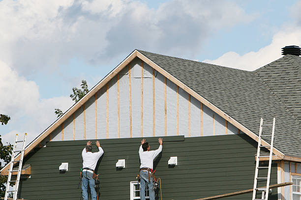 Professional Storm Damage Siding Repair technician working in Caret, VA